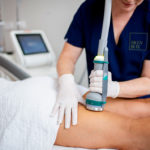 ONDA coolwaves treatment on legs with qualified dermal therapist