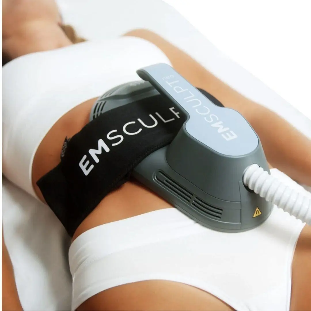 patient receiving treatment to abdomen with Emsculpt Neo